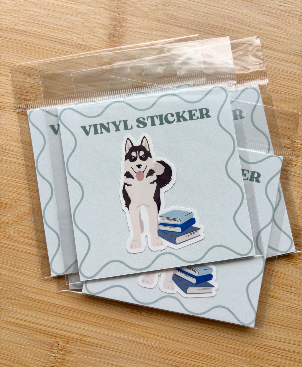 Dog on Books Sticker