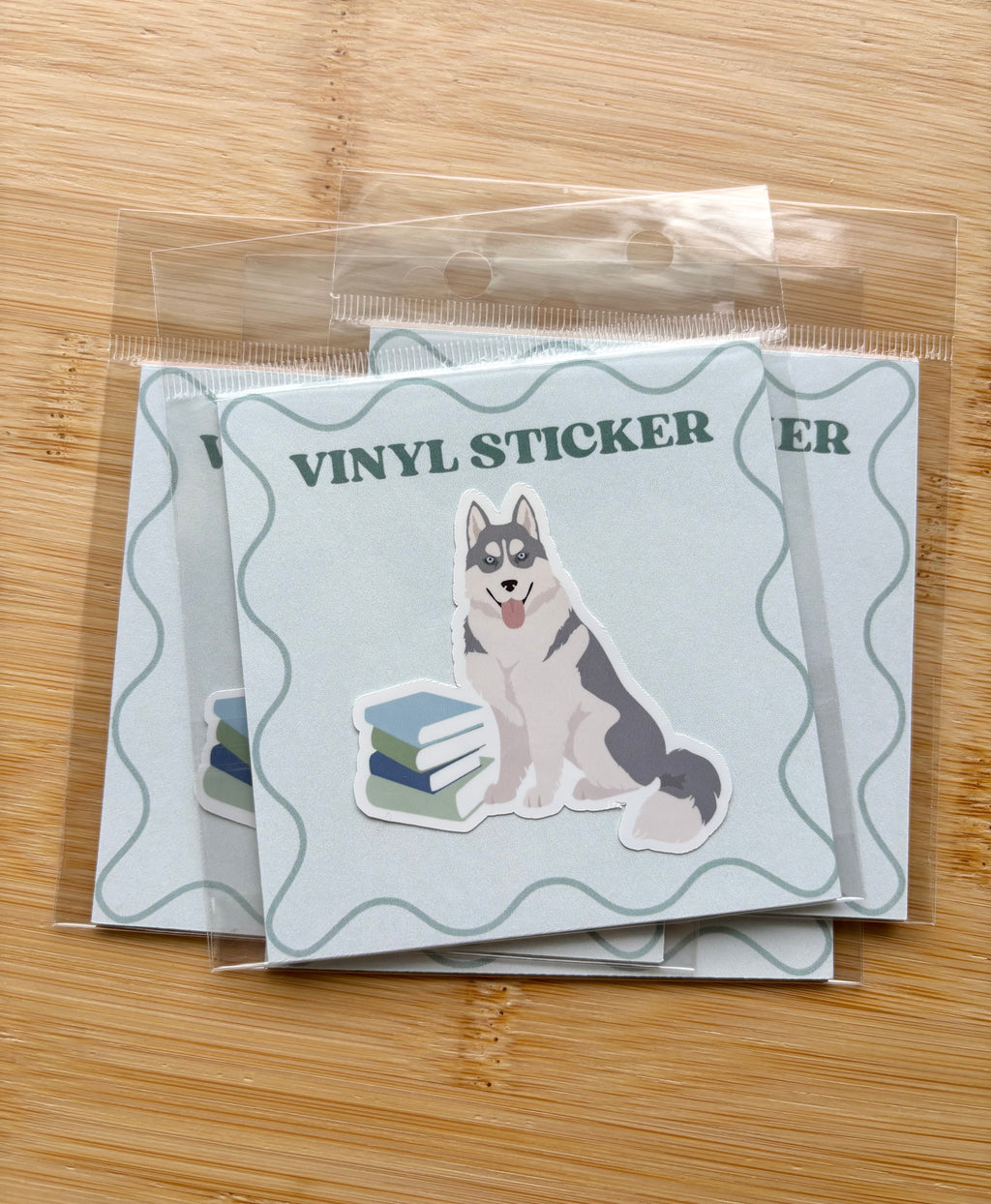Dog on Books Sticker