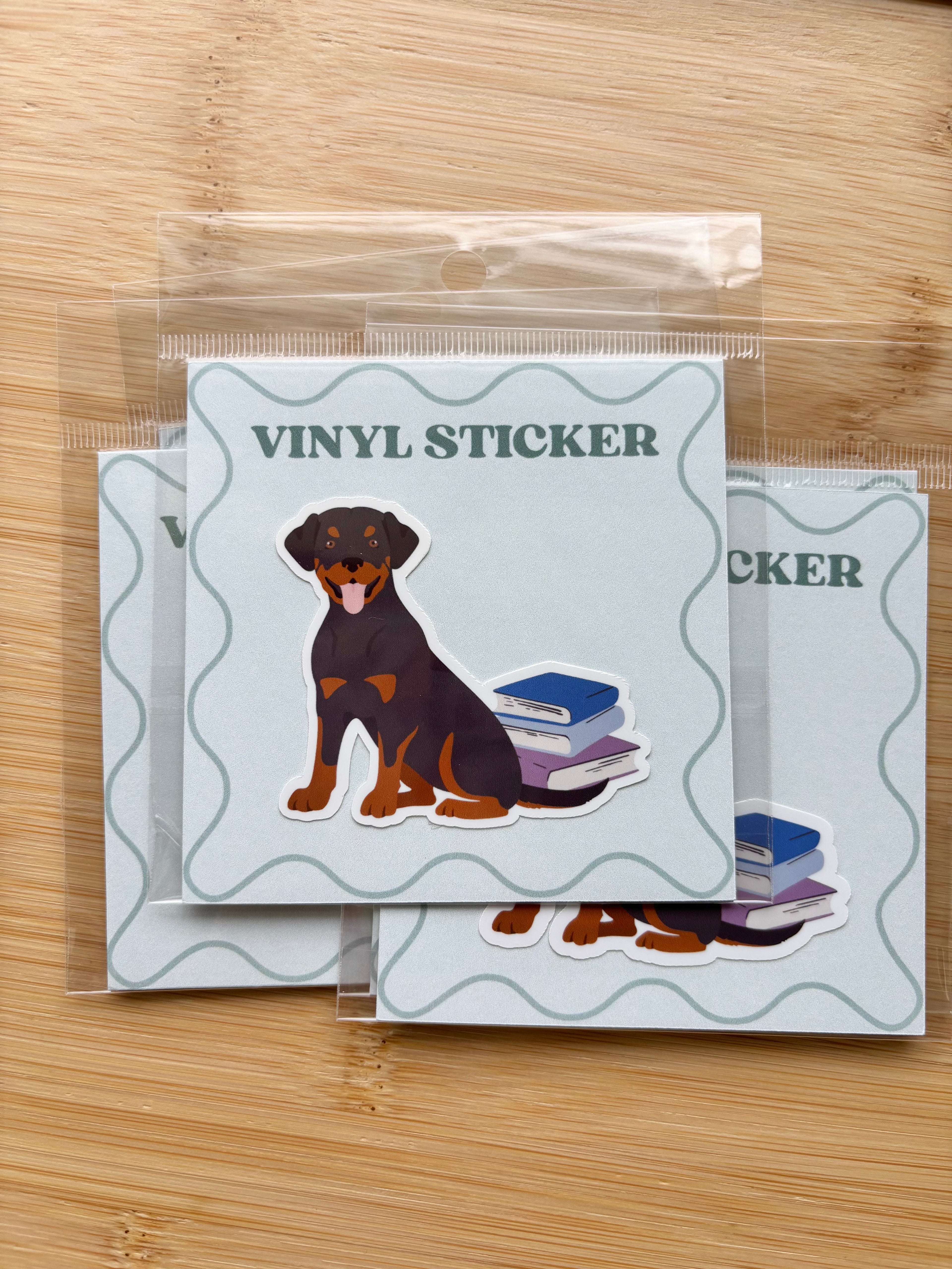 Dog on Books Sticker
