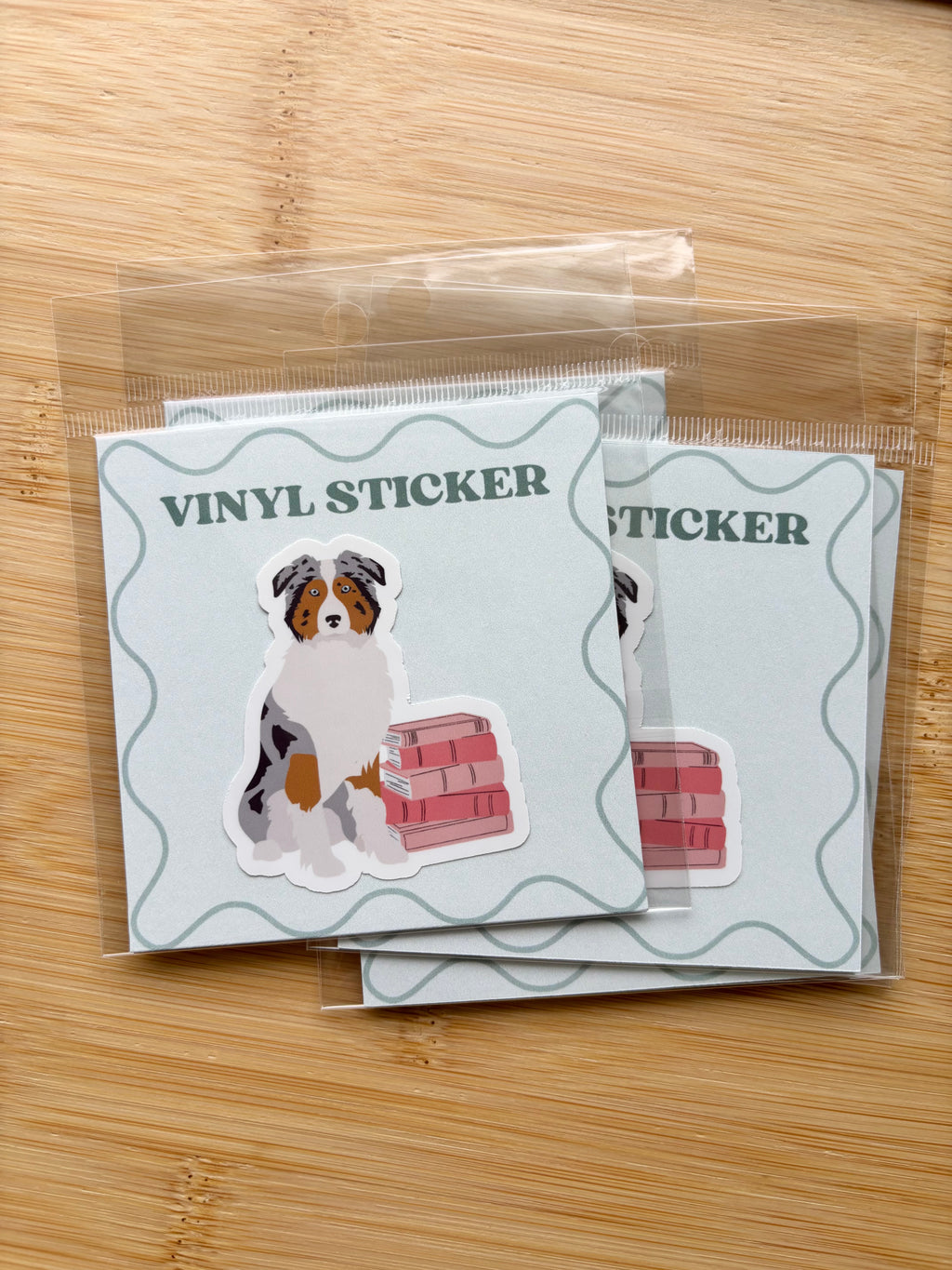 Dog on Books Sticker