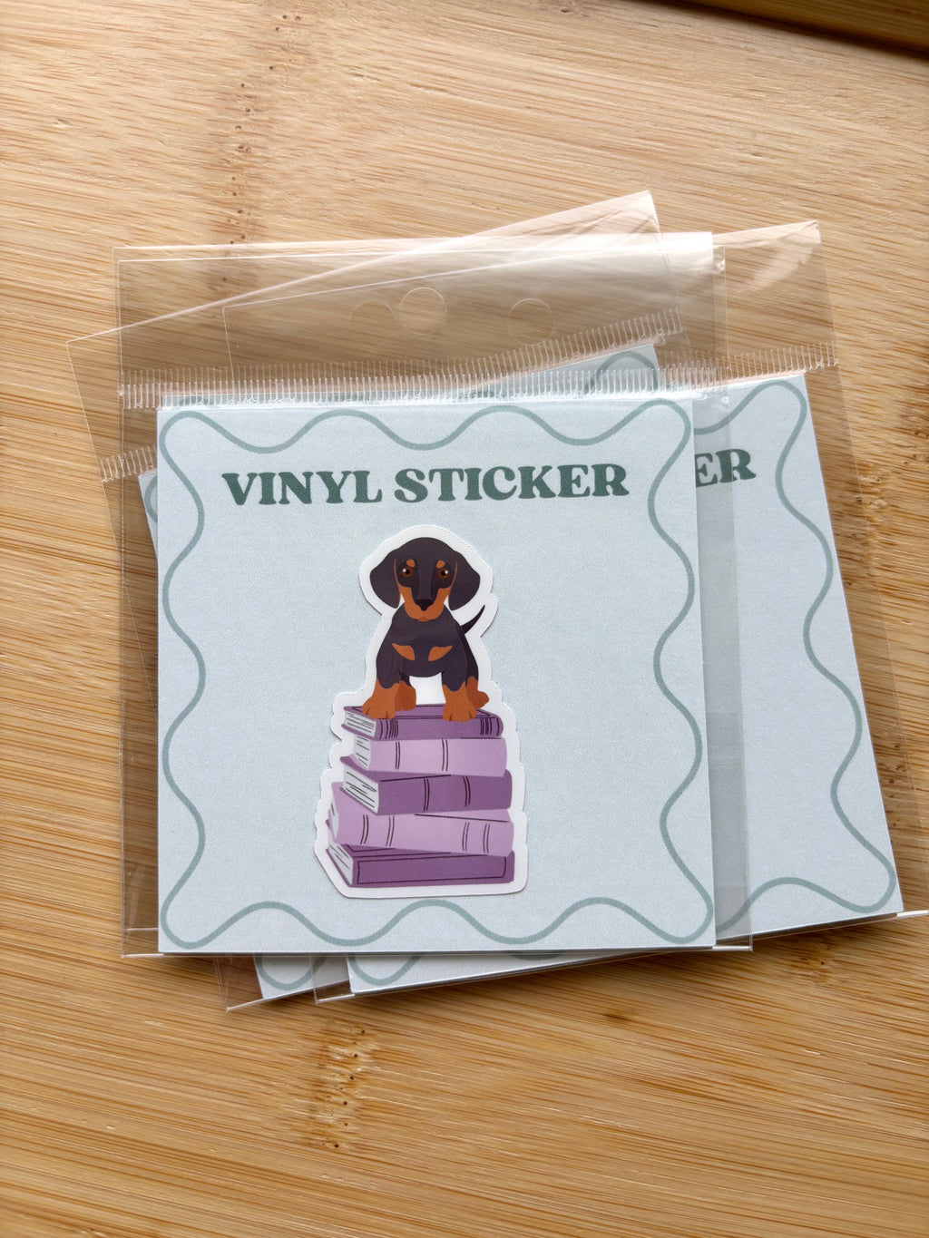 Dog on Books Sticker