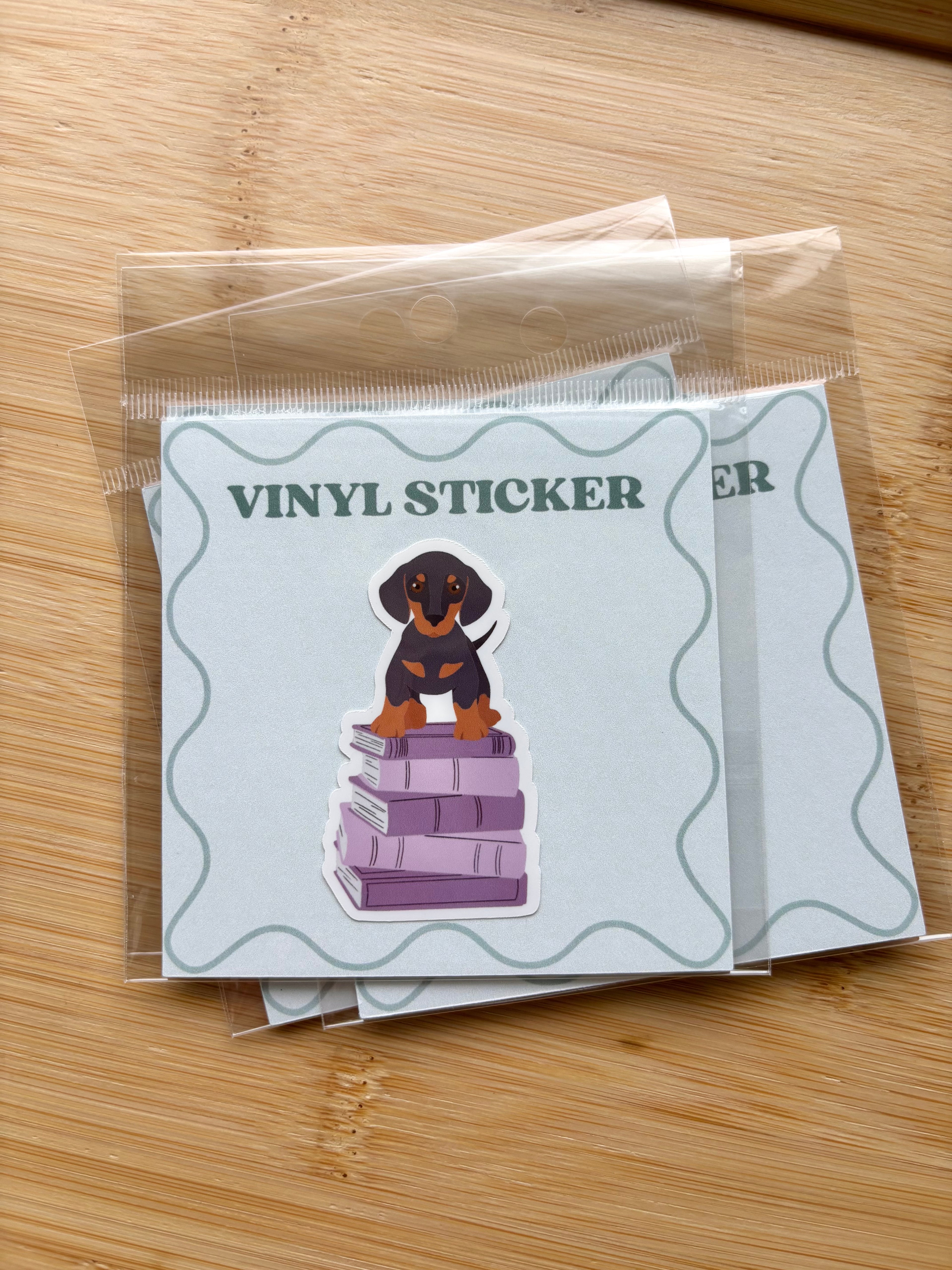 Dog on Books Sticker